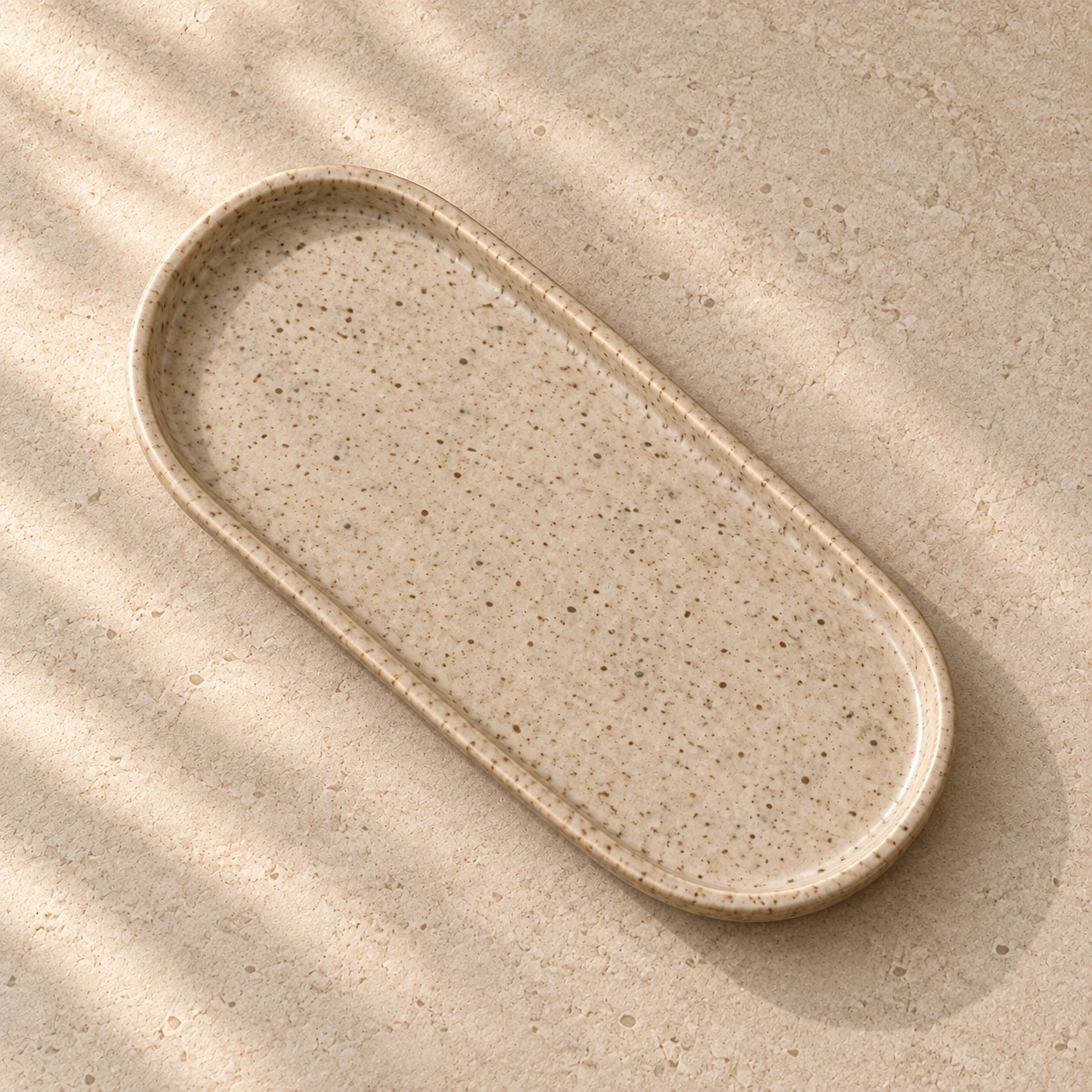 Overhead view of the rounded rectangular Soft Edge Table Tray